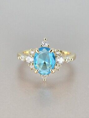 Blue Gemstone Halo Gold Ring